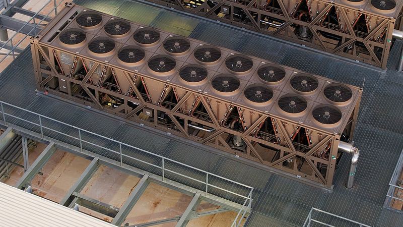 Rows of large fans on the roof of a data center